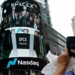 SpaceX branding displayed during trading following the company’s stock market debut.