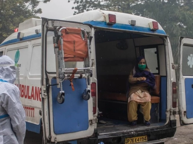 Rescue personnel at the site of an ammonia gas leak incident in Tamil Nadu, India.