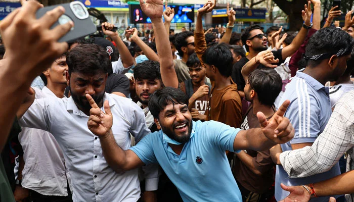 Youth protesters gather in New Delhi after Education Minister Dharmendra Pradhan resigned following nationwide demonstrations.