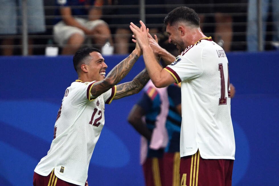 Spain players celebrate their 2-0 victory over France in the FIFA World Cup semi-final.