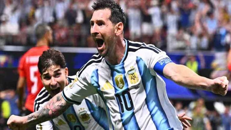 Argentina's players celebrate their 3-2 victory over Egypt in the FIFA World Cup round of 16.