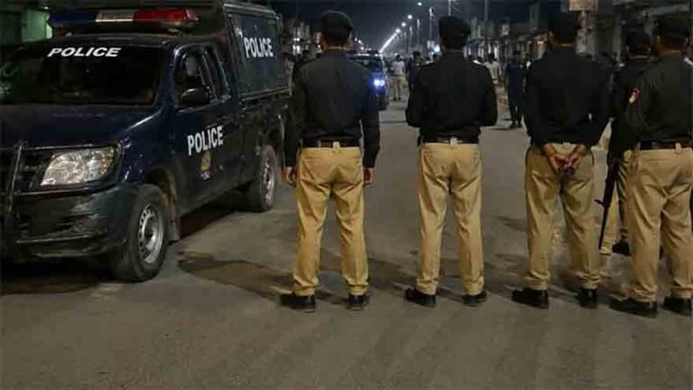 Security personnel conduct a rescue operation following the militant attack on a police checkpost in Ziarat, Balochistan.