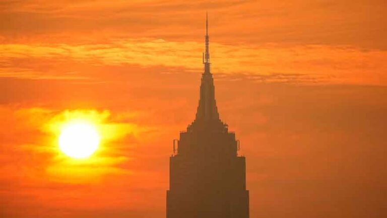 Thick wildfire smoke covers a US city as emergency crews respond to floods and wildfires across the country.