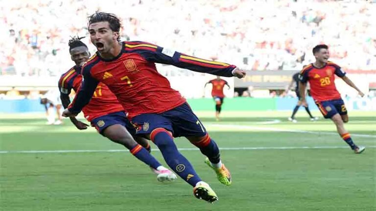 Spain players celebrate with the FIFA World Cup trophy after beating Argentina in the 2026 World Cup final.