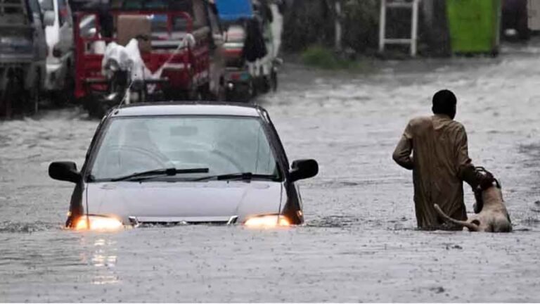 Storm clouds and heavy monsoon rain over Pakistan as the PMD issues a nationwide weather alert.