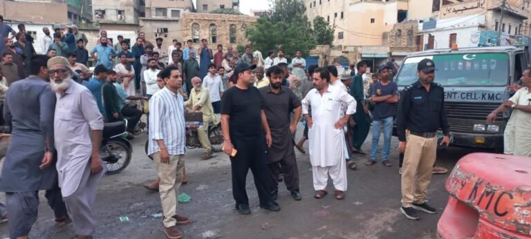 Officials remove illegal encroachments during an anti-encroachment operation in Karachi's South District.