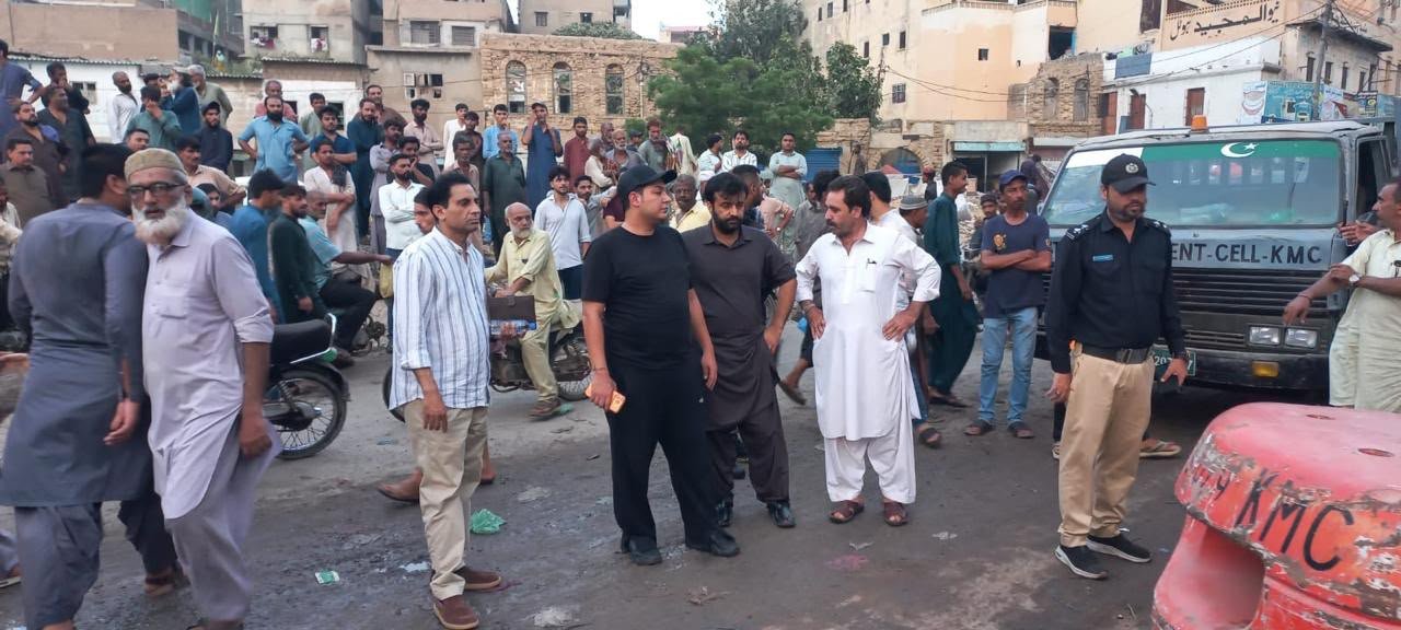 Officials remove illegal encroachments during an anti-encroachment operation in Karachi's South District.