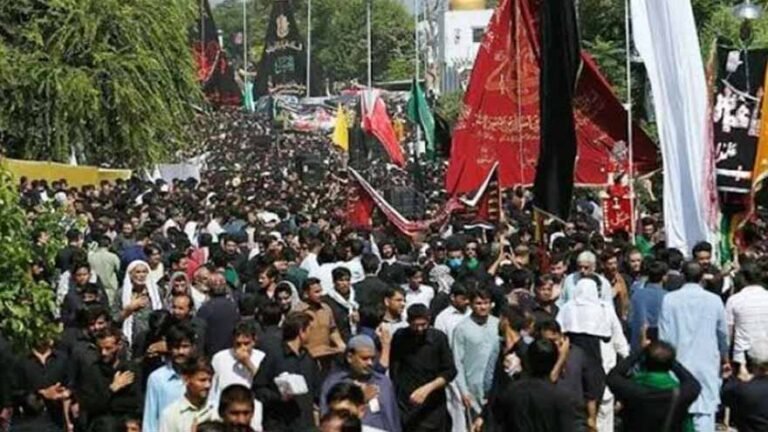 Security personnel monitor a Chehlum procession in Pakistan with barricades and police deployment.