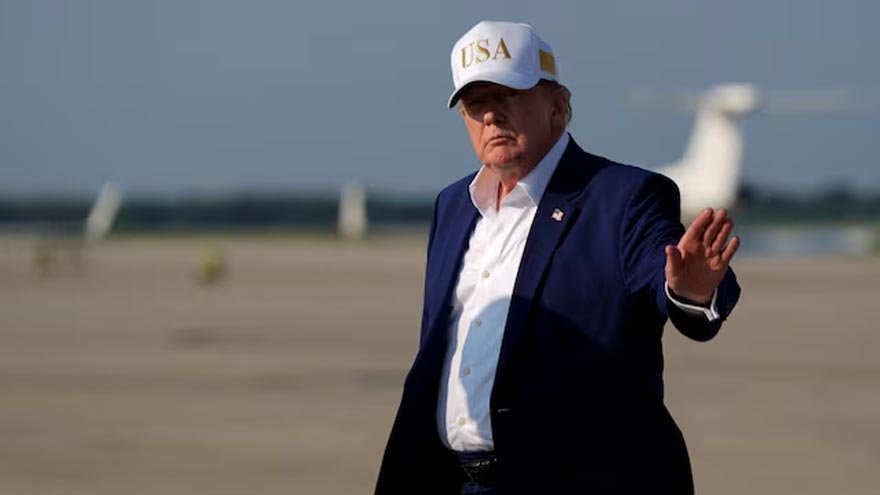 US President Donald Trump boards Air Force One during his international travel.