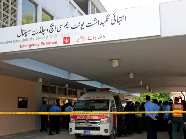 Rescue and firefighting teams at PIMS Hospital in Islamabad after a nursery fire killed 14 newborn babies.