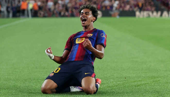 Barcelona players celebrate after defeating Rayo Vallecano 5-2 at Camp Nou.